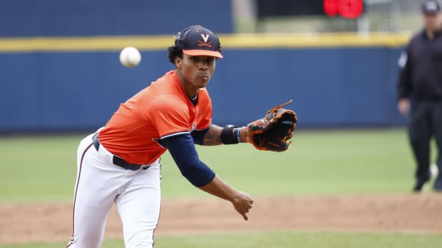 Jay Woolfolk delivers a pitch during the Virginia baseball game against UMass at Disharoon Park.